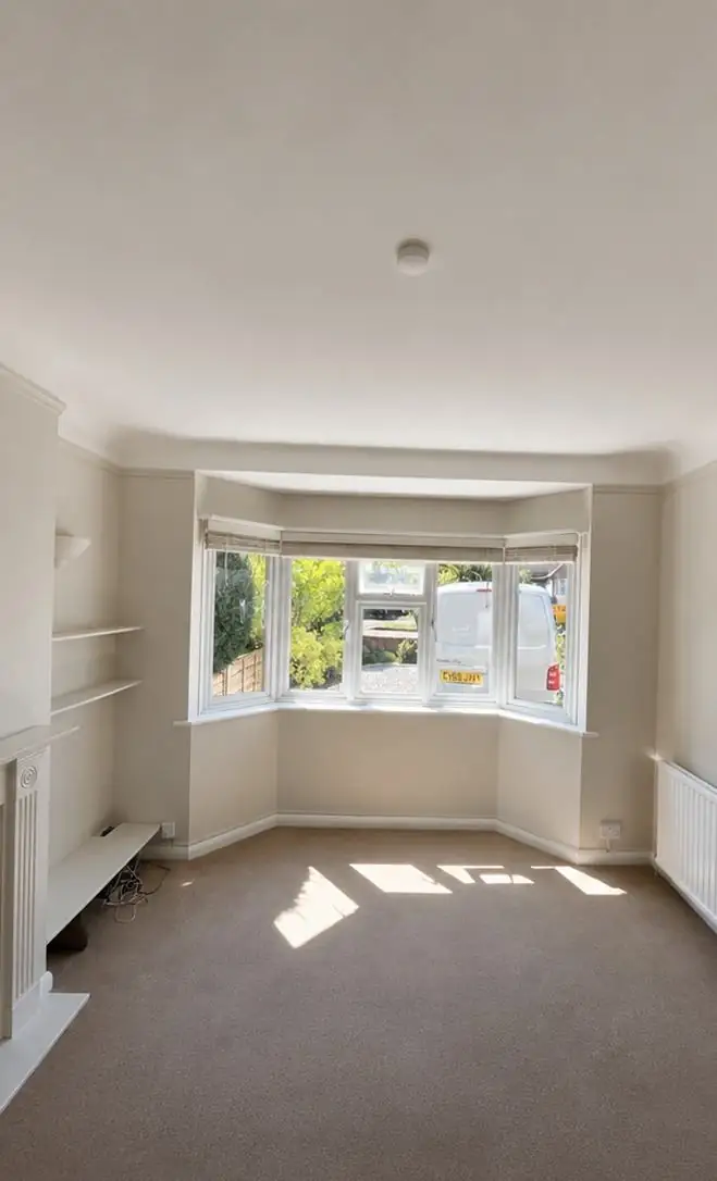 Bay-window lounge after repairs and redecoration