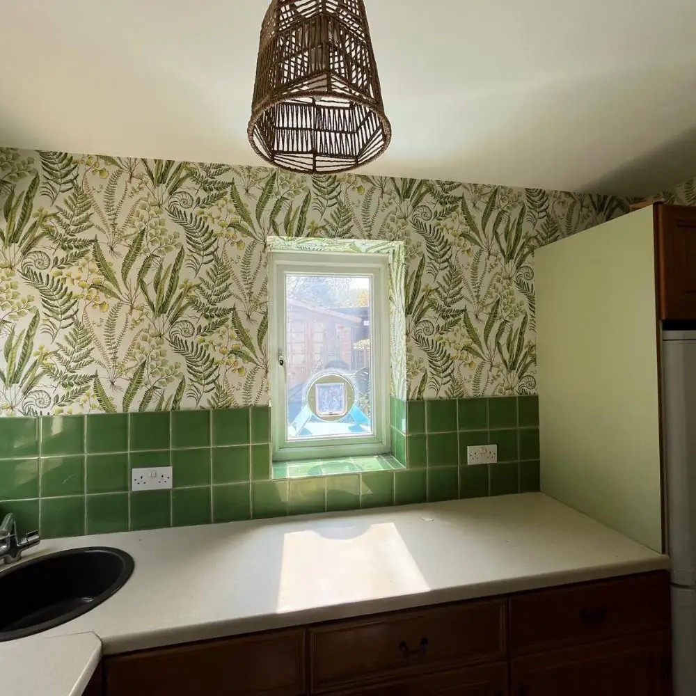 Kitchen with botanical feature wallpaper